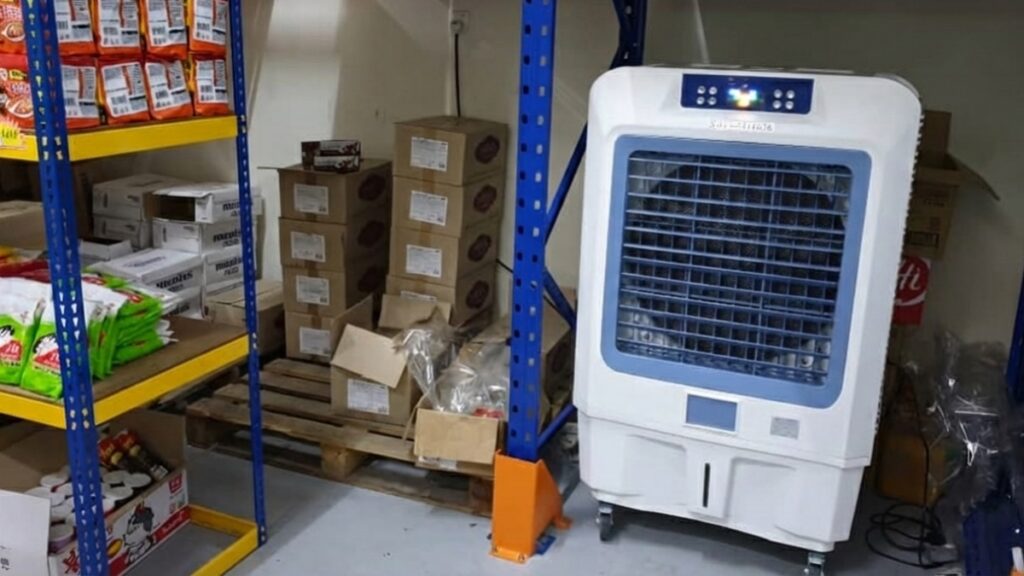 Portable air cooler rental unit deployed in warehouse storage area in Puchong Selangor