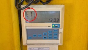 industrial air cooler control panel displaying E7 error code