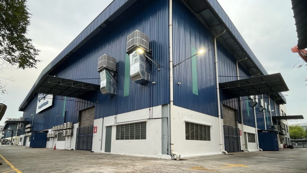Exterior view of CrystalAir AC-350 evaporative air coolers installed for a complete factory ventilation system.
