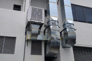 Improper air cooler ducting installation at a middle terrace shoplot