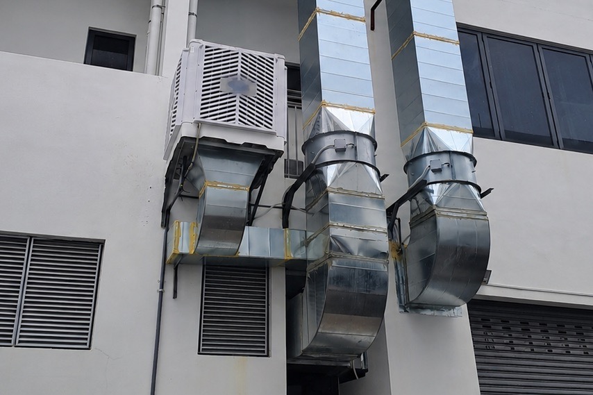 Improper air cooler ducting installation at a middle terrace shoplot