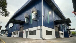 Exterior view of CrystalAir AC-350 evaporative air coolers installed for a complete factory ventilation system.