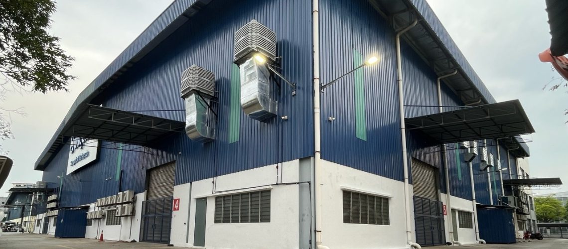 Exterior view of CrystalAir AC-350 evaporative air coolers installed for a complete factory ventilation system.