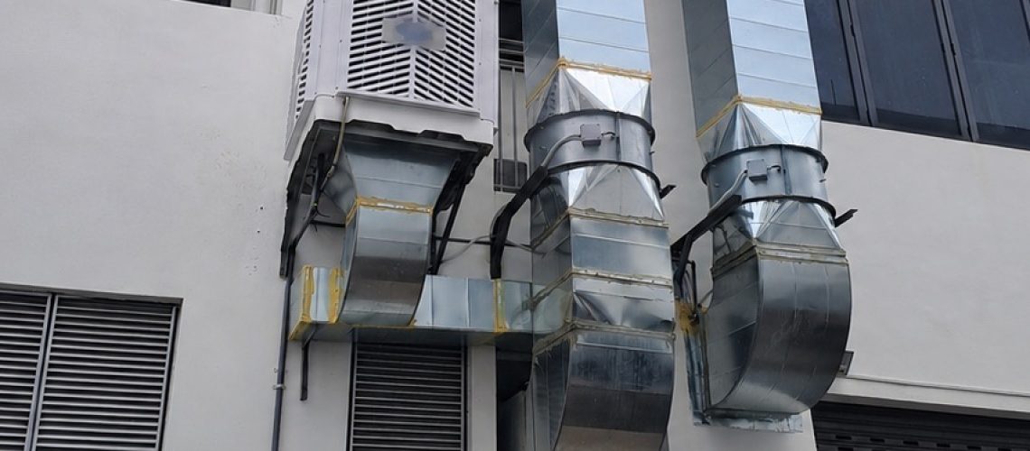 Improper air cooler ducting installation at a middle terrace shoplot
